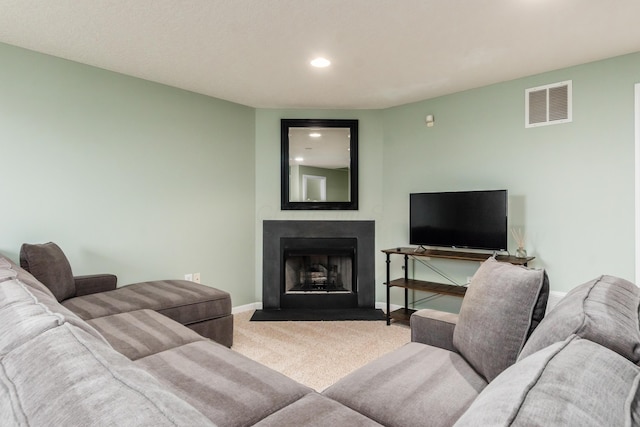 5958 Central College Rd, New Albany, OH 43054 - living area featuring carpet, baseboards, a fireplace with flush hearth, and recessed lighting