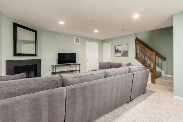5958 Central College Rd, New Albany, OH 43054 - living room with light colored carpet, recessed lighting, stairs, a fireplace, and baseboards