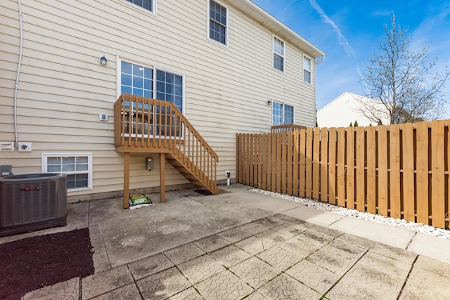 5958 Central College Rd, New Albany, OH 43054 - back of house with cooling unit, a patio, and fence