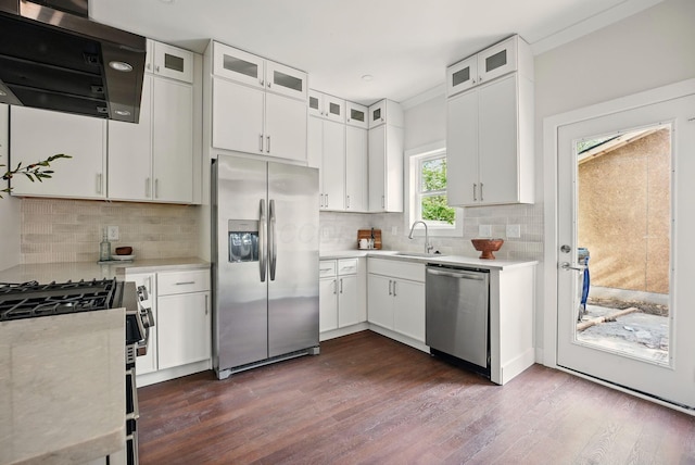 436 W 2nd Ave, Columbus, OH 43201 - kitchen featuring stainless steel appliances, range hood, a sink, and light countertops