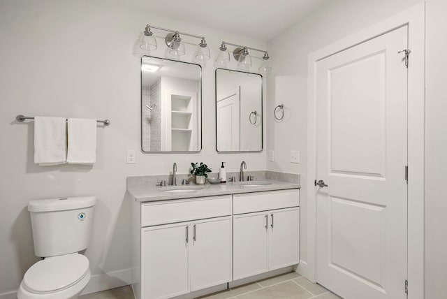 436 W 2nd Ave, Columbus, OH 43201 - bathroom with toilet, double vanity, and tile patterned floors