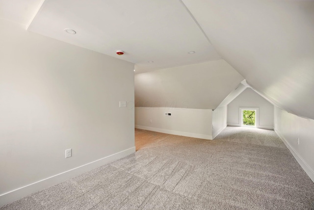 436 W 2nd Ave, Columbus, OH 43201 - additional living space featuring carpet flooring, vaulted ceiling, and baseboards