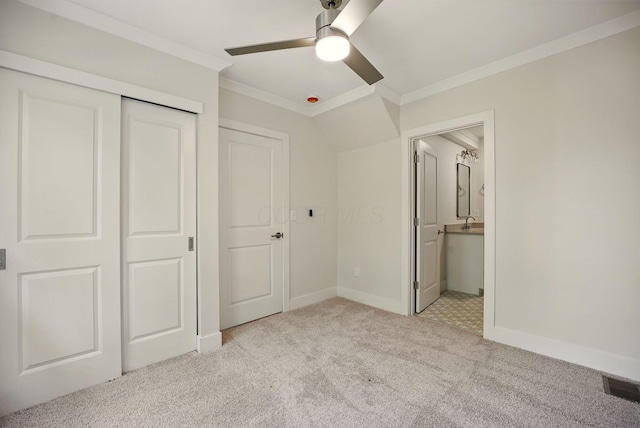 436 W 2nd Ave, Columbus, OH 43201 - unfurnished bedroom featuring crown molding, carpet, a closet, baseboards, and ensuite bathroom