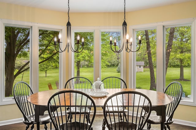 5098 Cascade Dr, Powell, OH 43065 - sunroom with a chandelier, baseboards, and wood finished floors