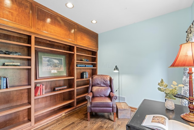 5098 Cascade Dr, Powell, OH 43065 - living area featuring wood finished floors and recessed lighting