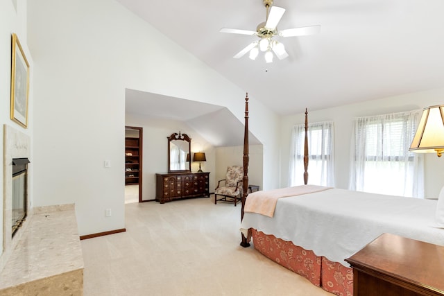 5098 Cascade Dr, Powell, OH 43065 - carpeted bedroom with vaulted ceiling, baseboards, and a ceiling fan