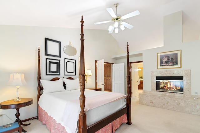 5098 Cascade Dr, Powell, OH 43065 - bedroom with light carpet, a fireplace, high vaulted ceiling, ensuite bathroom, and ceiling fan
