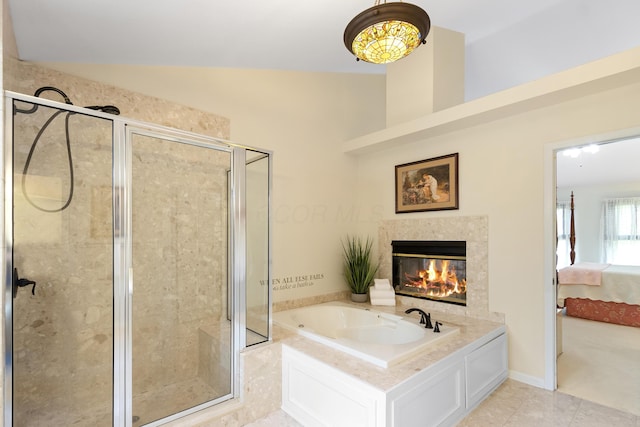 5098 Cascade Dr, Powell, OH 43065 - full bathroom with a garden tub, a stall shower, a high end fireplace, and ensuite bath