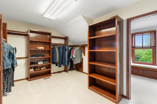 5098 Cascade Dr, Powell, OH 43065 - walk in closet featuring light carpet and lofted ceiling