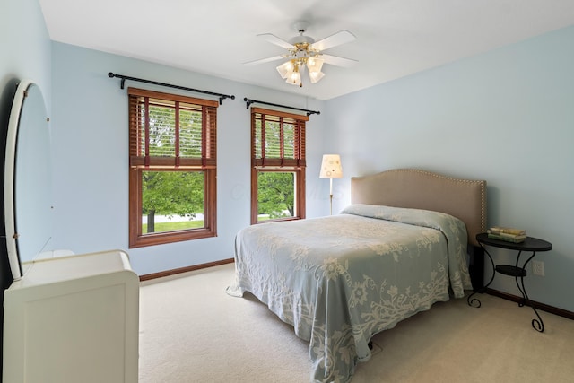 5098 Cascade Dr, Powell, OH 43065 - carpeted bedroom with baseboards and a ceiling fan