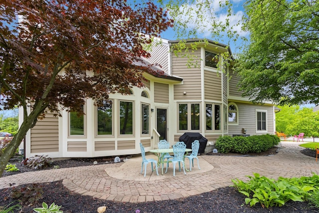 5098 Cascade Dr, Powell, OH 43065 - rear view of property featuring a patio