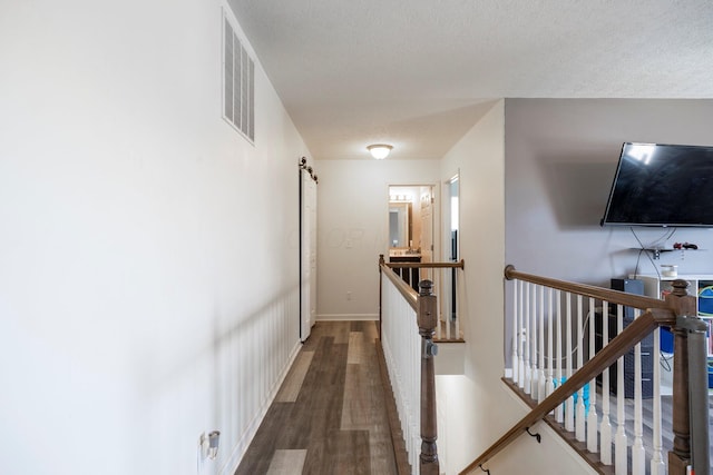 447 Wingate Pl, Mount Sterling, OH 43143 - hall featuring an upstairs landing, wood finished floors, and baseboards