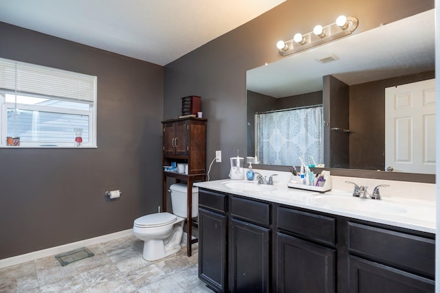 447 Wingate Pl, Mount Sterling, OH 43143 - full bath featuring toilet, baseboards, double vanity, and a shower with curtain