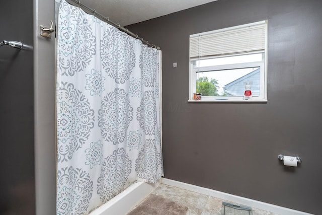447 Wingate Pl, Mount Sterling, OH 43143 - bathroom featuring baseboards and a shower with curtain