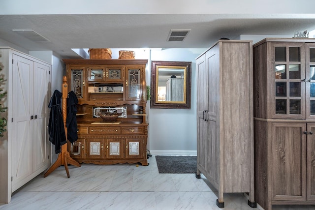 447 Wingate Pl, Mount Sterling, OH 43143 - foyer entrance featuring light marble finish floors and baseboards