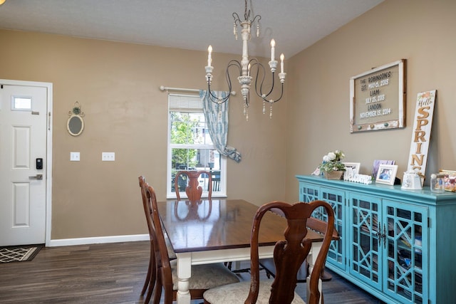 447 Wingate Pl, Mount Sterling, OH 43143 - dining space featuring dark wood finished floors, a chandelier, and baseboards