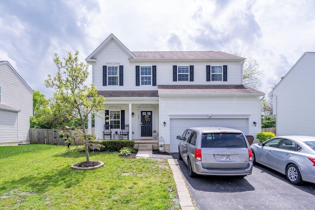 447 Wingate Pl, Mount Sterling, OH 43143 - traditional-style home with a porch, driveway, and an attached garage