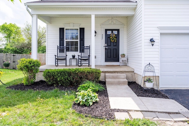 447 Wingate Pl, Mount Sterling, OH 43143 - view of exterior entry with covered porch and fence