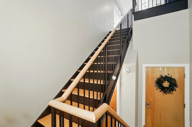 300 W Spring St Unit 515, Columbus, OH 43215 - stairs with a towering ceiling