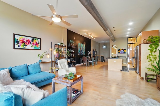 300 W Spring St Unit 515, Columbus, OH 43215 - living room with light wood-style flooring and a ceiling fan