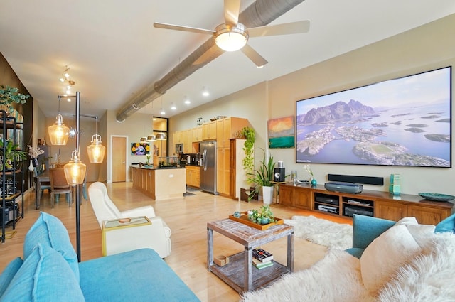 300 W Spring St Unit 515, Columbus, OH 43215 - living area featuring light wood finished floors and a ceiling fan