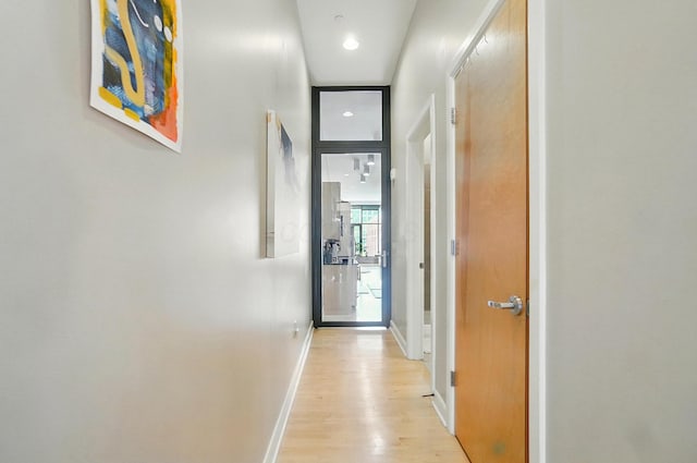 300 W Spring St Unit 515, Columbus, OH 43215 - corridor with light wood-style floors, baseboards, and recessed lighting