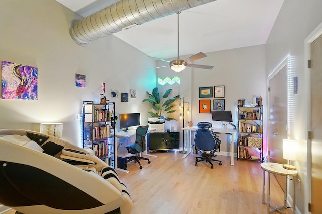 300 W Spring St Unit 515, Columbus, OH 43215 - home office with wood finished floors, a ceiling fan, and a high ceiling