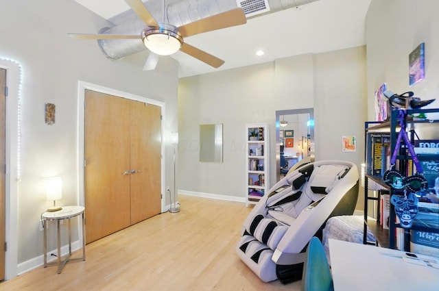 300 W Spring St Unit 515, Columbus, OH 43215 - exercise area with ceiling fan, baseboards, and wood finished floors