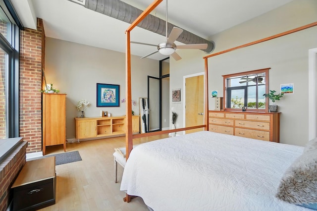 300 W Spring St Unit 515, Columbus, OH 43215 - bedroom with light wood finished floors and ceiling fan