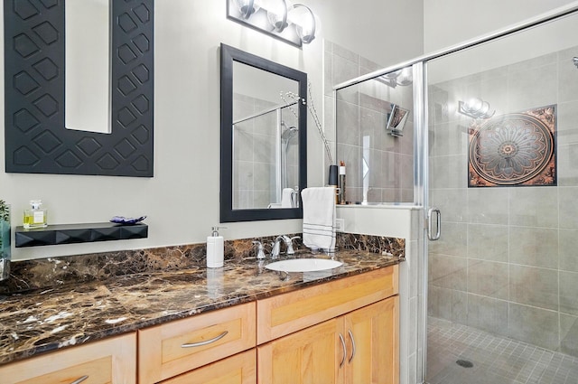 300 W Spring St Unit 515, Columbus, OH 43215 - bathroom featuring vanity and a shower stall