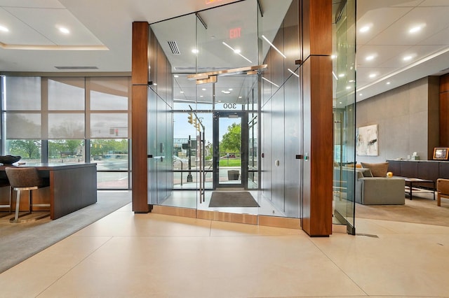 300 W Spring St Unit 515, Columbus, OH 43215 - common area with expansive windows, a towering ceiling, and recessed lighting