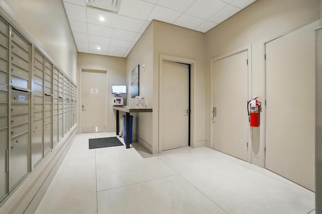 300 W Spring St Unit 515, Columbus, OH 43215 - view of property's community with mail area and a paneled ceiling