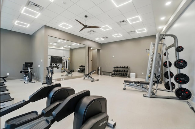 300 W Spring St Unit 515, Columbus, OH 43215 - gym with a paneled ceiling, ceiling fan, and baseboards