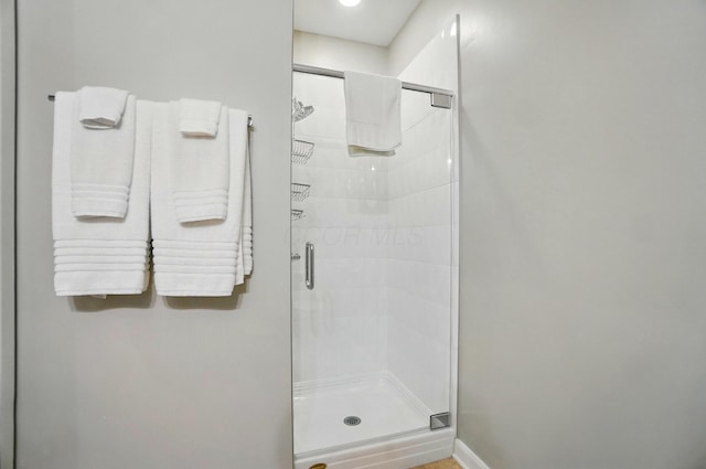300 W Spring St Unit 515, Columbus, OH 43215 - full bath featuring a shower stall and baseboards