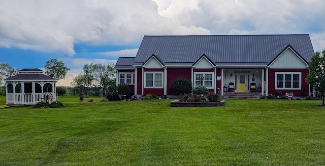 5353 Buckeye Valley Rd NE, New Lexington, OH 43764 - view of front facade with a front yard, a gazebo, metal roof, and a porch