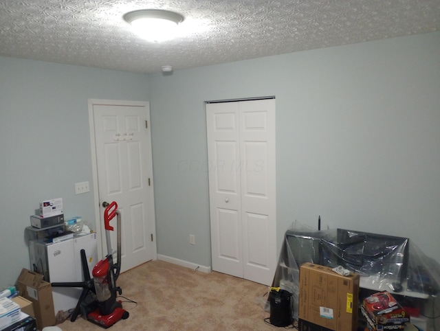 5888 Abernathy Ln Unit 5888A, Columbus, OH 43232 - home office with carpet flooring and a textured ceiling
