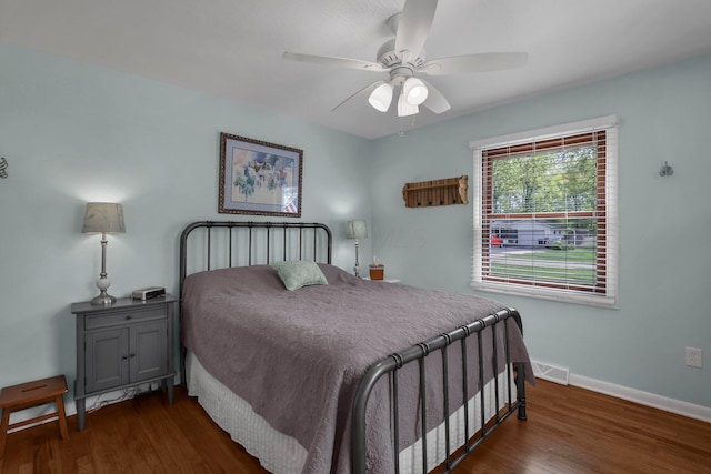 6641 Charles Rd, Westerville, OH 43082 - bedroom featuring dark wood-style floors, baseboards, and ceiling fan