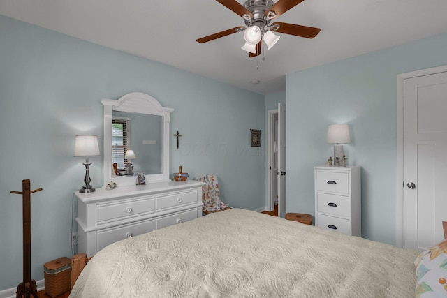6641 Charles Rd, Westerville, OH 43082 - bedroom featuring baseboards and a ceiling fan