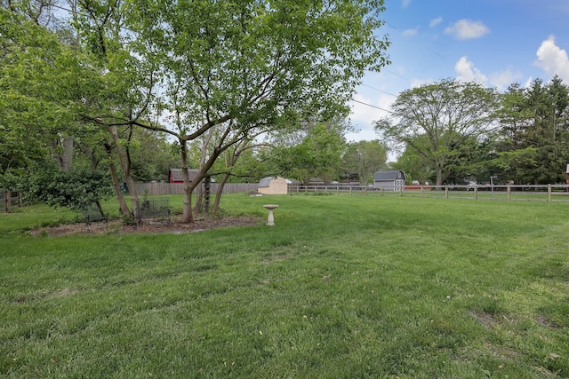 6641 Charles Rd, Westerville, OH 43082 - view of yard featuring a storage unit and an outbuilding
