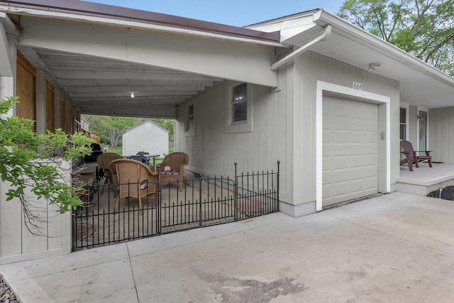 6641 Charles Rd, Westerville, OH 43082 - view of home's exterior with a garage, fence, and a storage unit