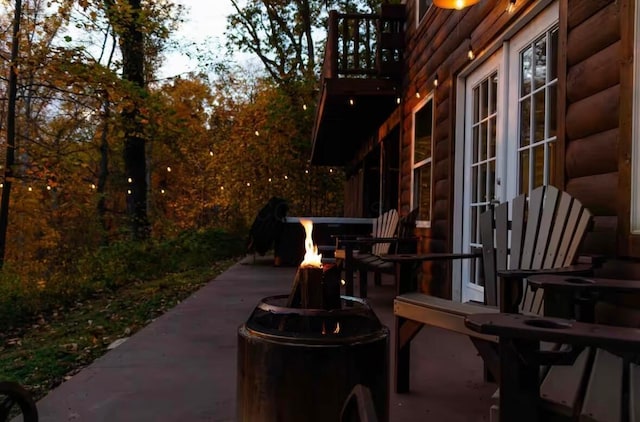820 Pump Station Rd SE, Sugar Grove, OH 43155 - view of patio / terrace featuring a fire pit and a balcony