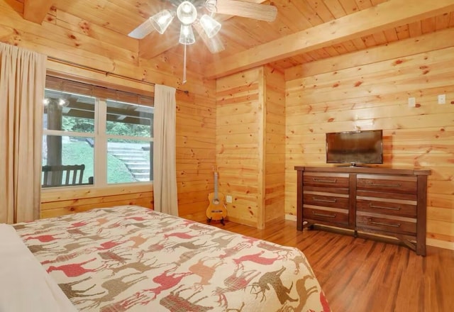 820 Pump Station Rd SE, Sugar Grove, OH 43155 - bedroom with wooden walls, wood ceiling, beam ceiling, wood finished floors, and ceiling fan