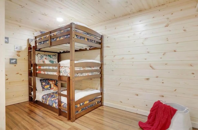 820 Pump Station Rd SE, Sugar Grove, OH 43155 - bedroom featuring wood finished floors, wood walls, wood ceiling, and baseboards