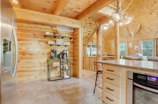 820 Pump Station Rd SE, Sugar Grove, OH 43155 - kitchen featuring stainless steel appliances, wood walls, beam ceiling, wooden ceiling, and a chandelier