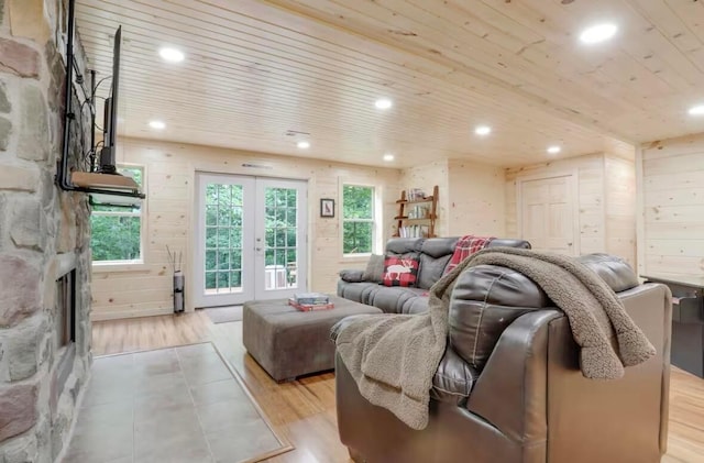 820 Pump Station Rd SE, Sugar Grove, OH 43155 - living area with light wood-type flooring, recessed lighting, wooden ceiling, and a stone fireplace