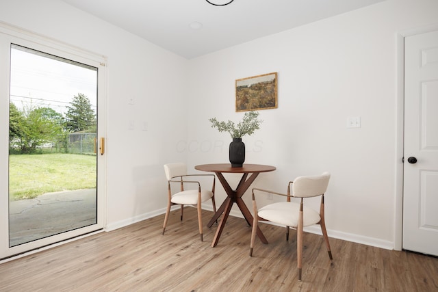 1876 Valcon Ave, Columbus, OH 43207 - dining space featuring light wood-style flooring and baseboards