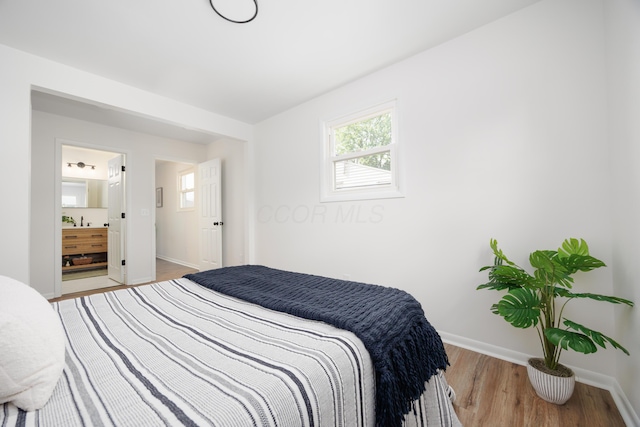 1876 Valcon Ave, Columbus, OH 43207 - bedroom with wood finished floors and baseboards