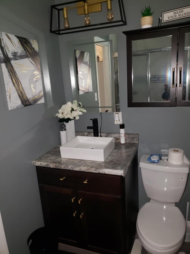 5060 Brinwood Pl, Columbus, OH 43232 - bathroom featuring vanity and toilet