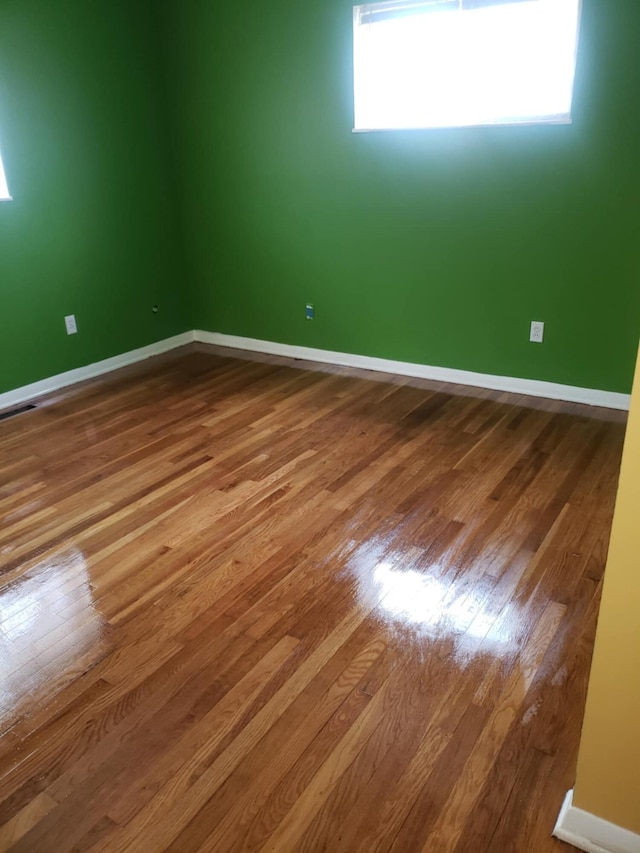5060 Brinwood Pl, Columbus, OH 43232 - unfurnished room with wood finished floors and baseboards