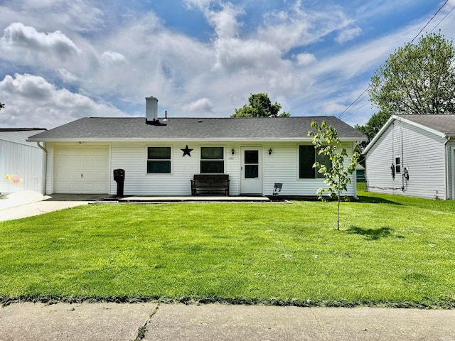 965 Bikini Dr, Marion, OH 43302 - ranch-style house with a chimney, a front yard, driveway, and a garage